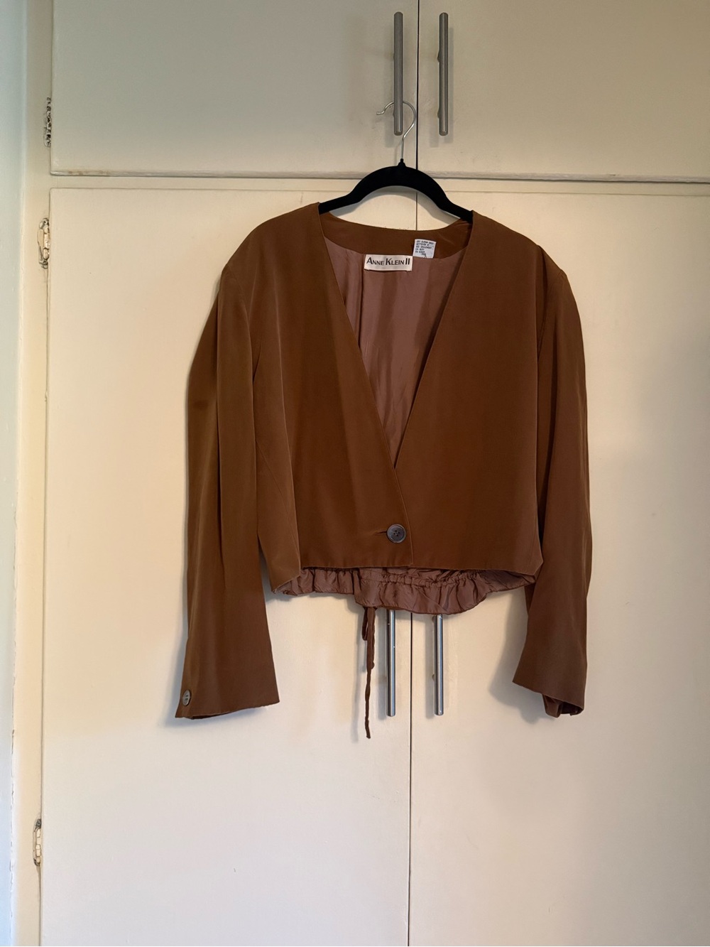 100% Silk Cropped little brown tie back top. Perfect